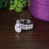Lizzie Oval 18Karat White Gold Moissanite Engagement Ring
