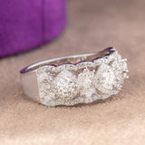 Tariqa Moissanite Sterling Silver Wedding Band